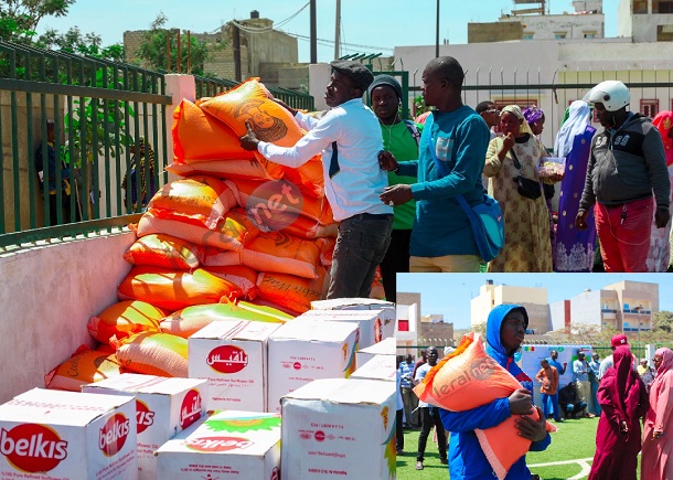 kits-alimentaires-remis-a-des-familles.jpg